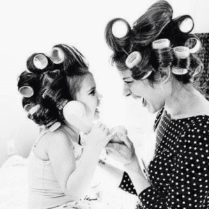 Mum and her daughter wearing curlers